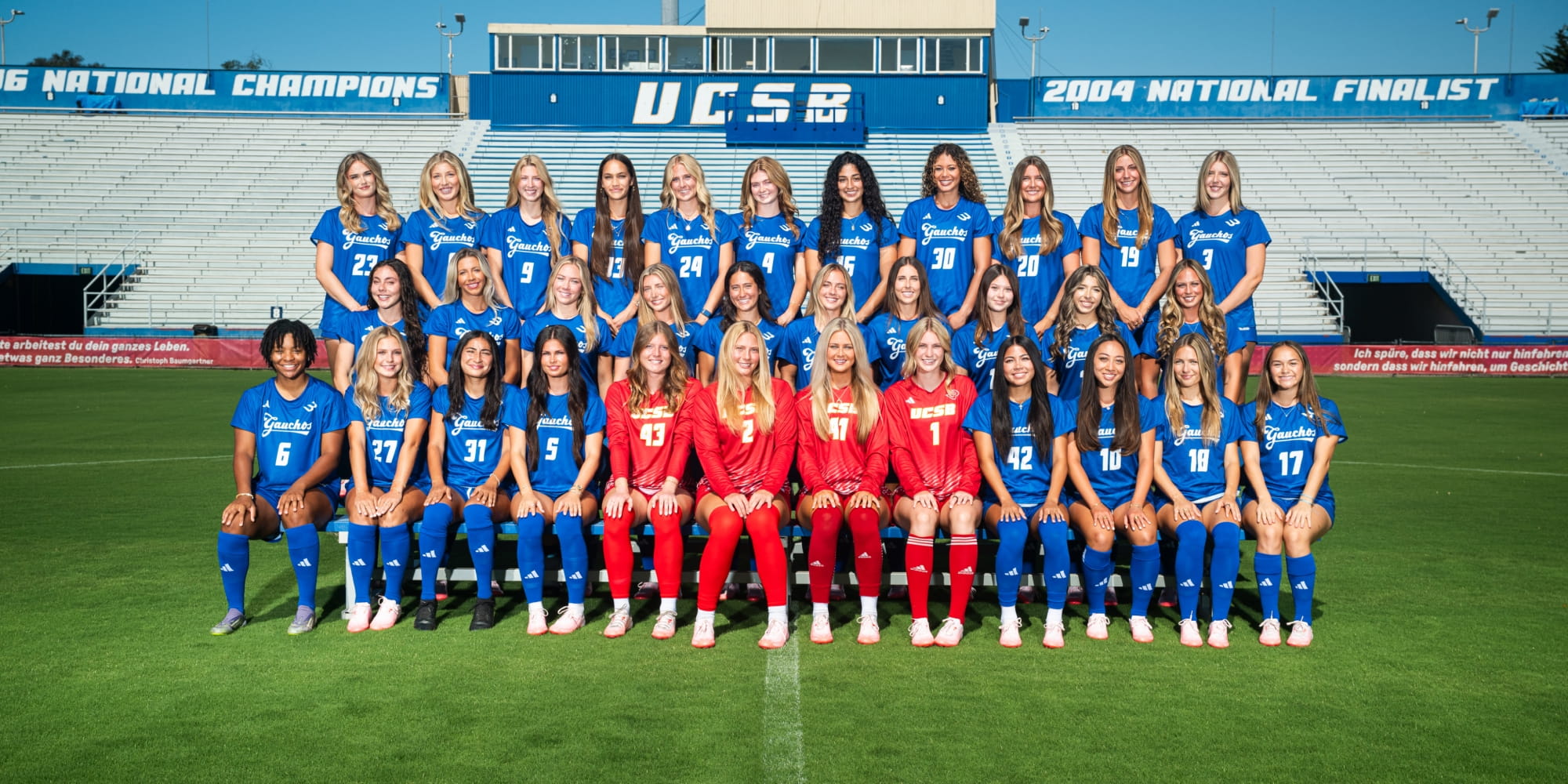 Women's Soccer team posing at Harder Stadium