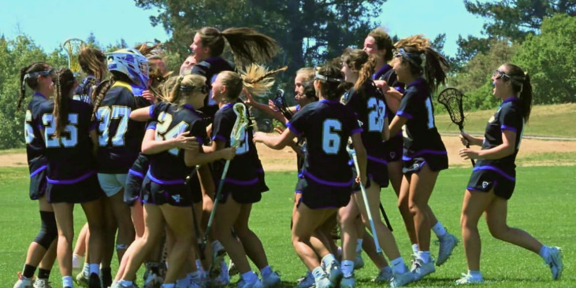 UCSB women's lacrosse team celebrating