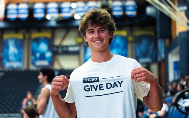 Volleyball player wearing Give Day shirt