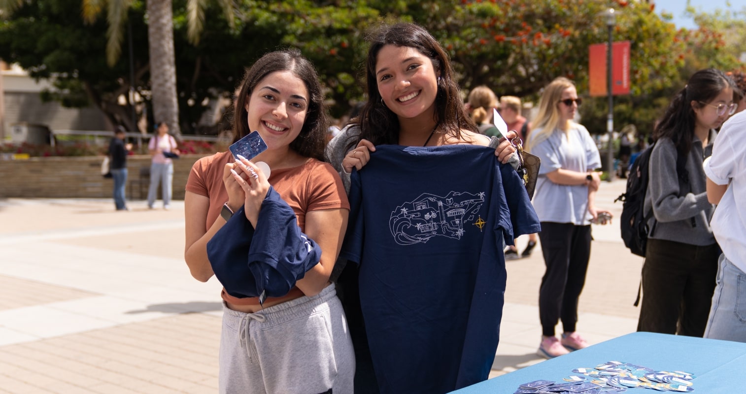 Two students posing on Give Day