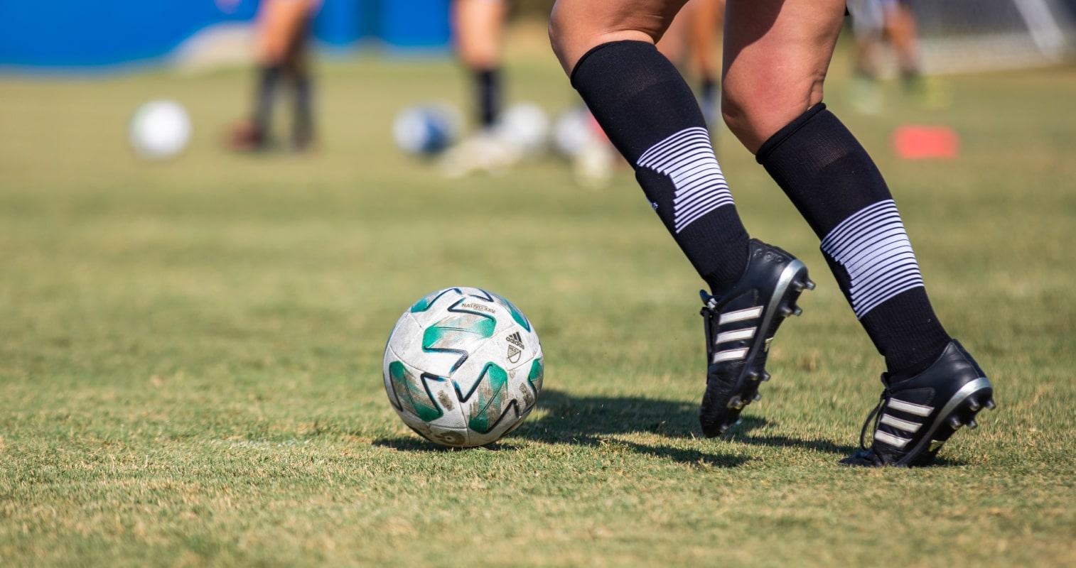 Students playing soccer